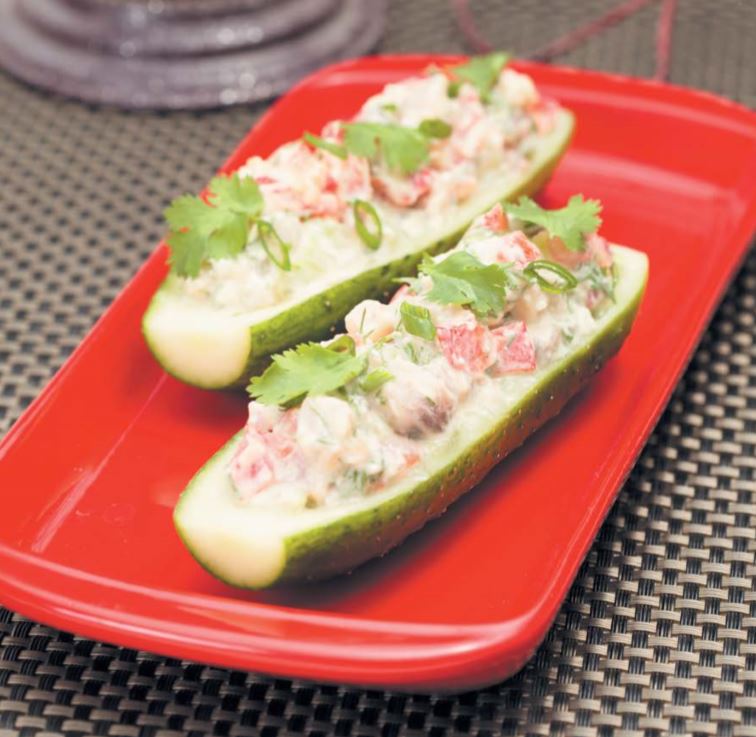 Огурцы с сельдью, помидором и сыром